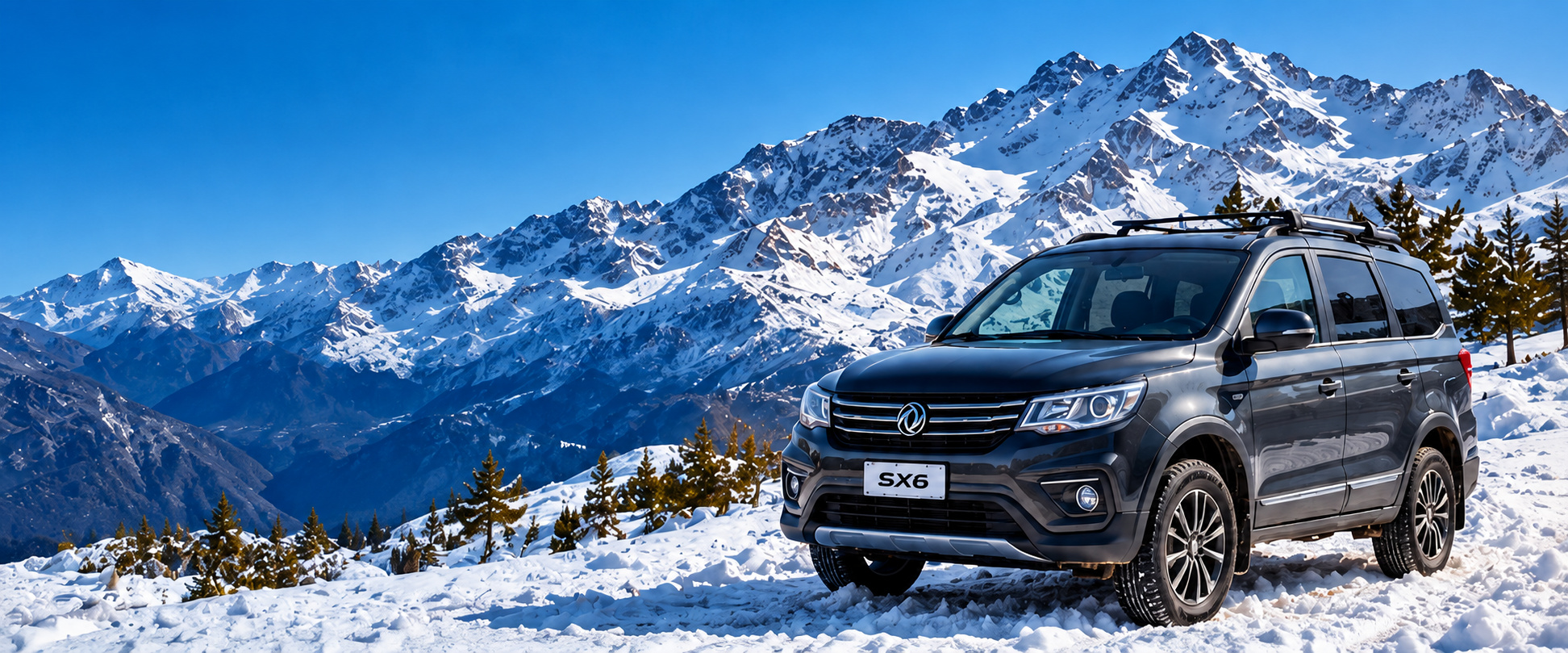 Camioneta SUV frente a la Cordillera de los Andes nevada
